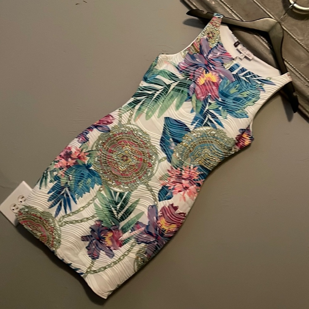 Jennifer Lopez  print dress fully lined for any imperfections. New size XS